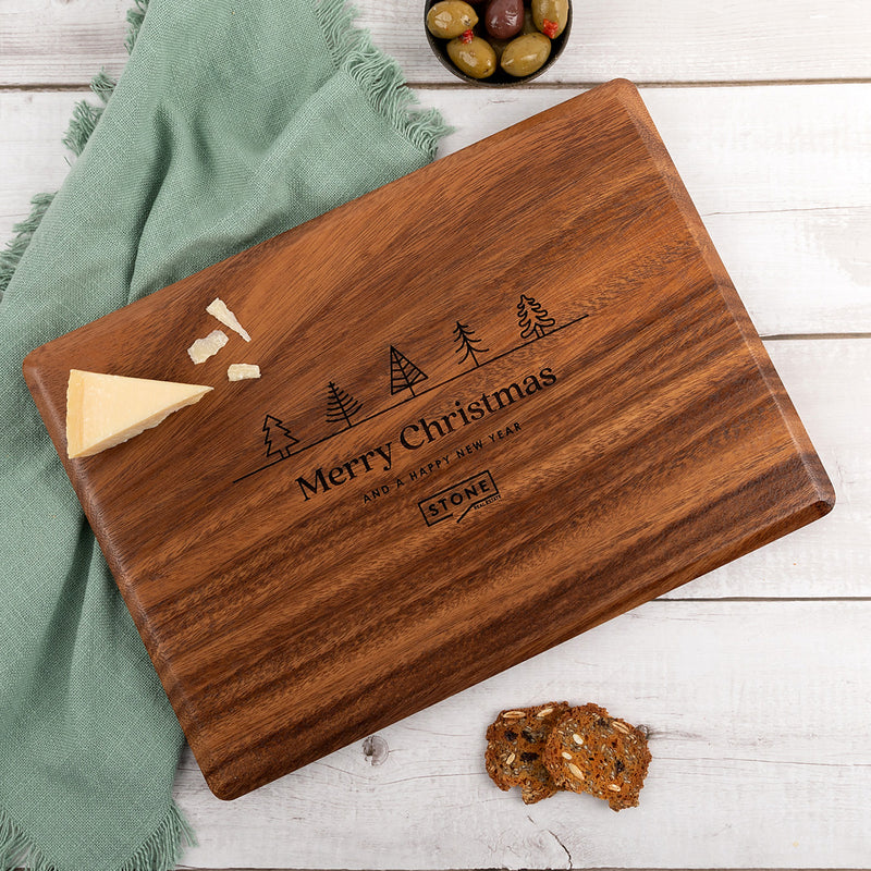 Engraved walnut wood serving board with company logo, perfect for corporate Christmas gifting