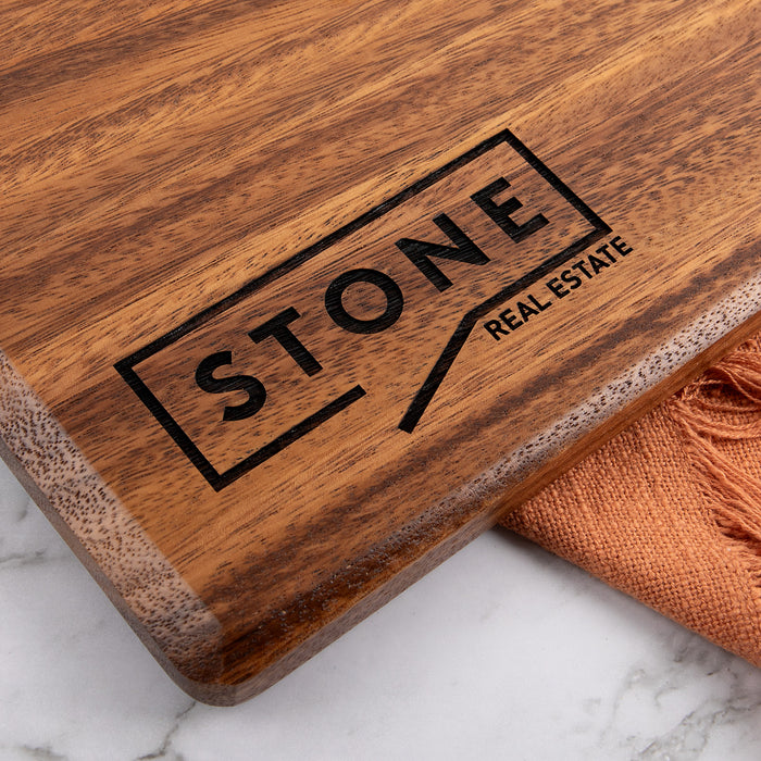 Custom engraved wooden cheese board for employee rewards and business milestone celebrations