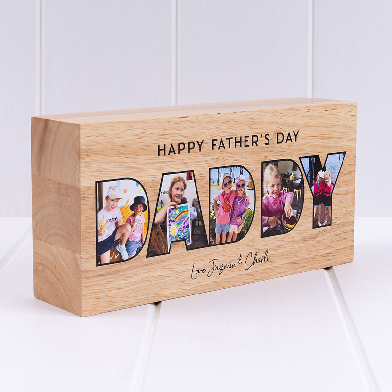 Personalised wooden photo block featuring five family photos inside the word DADDY with a Happy Father's Day message.
