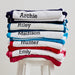 Set of personalised striped towels - each embroidered with a child’s name for a unique Christmas gift