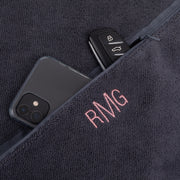 Charcoal gym towel with custom initials embroidery and storage pocket