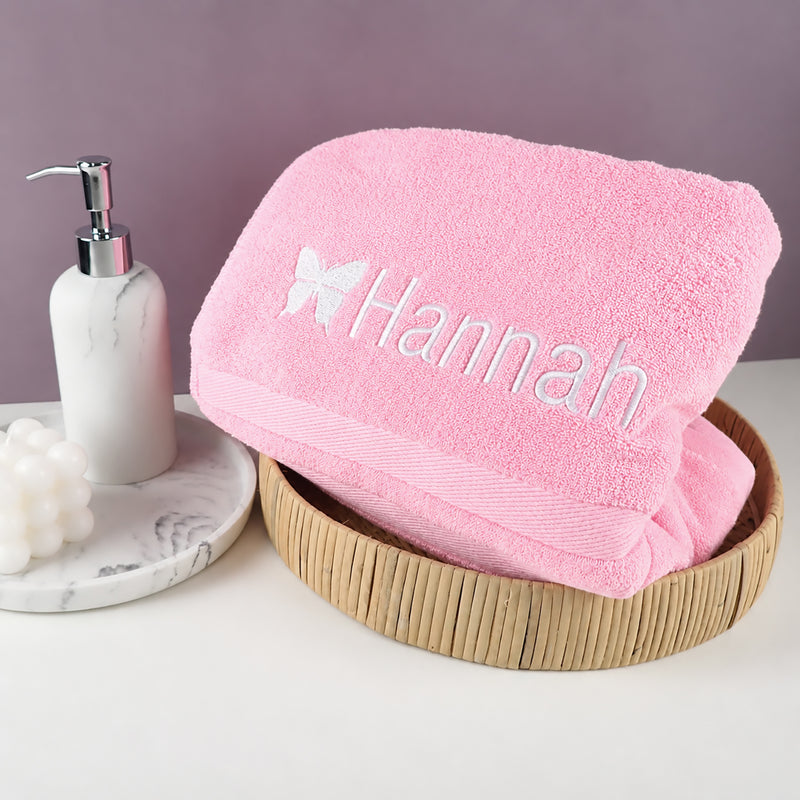 Pink butterfly bath towel for girls, personalised with their name, a thoughtful birthday or Christmas gift.