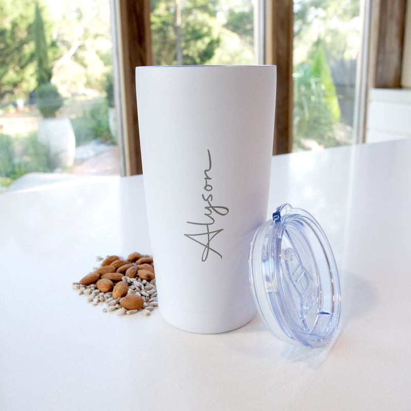 White double-walled travel mug with personalised engraving, ideal everyday gift