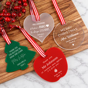 Personalised acrylic teacher Christmas decorations in frosted, clear, green and red designs.