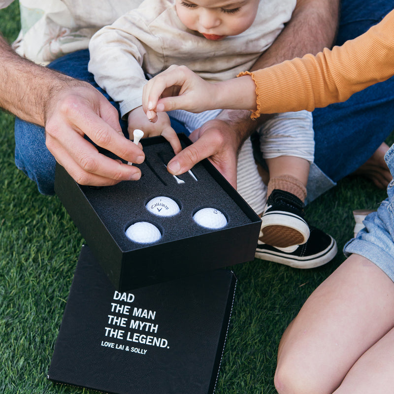 Stylish golfer gift box filled with golf essentials