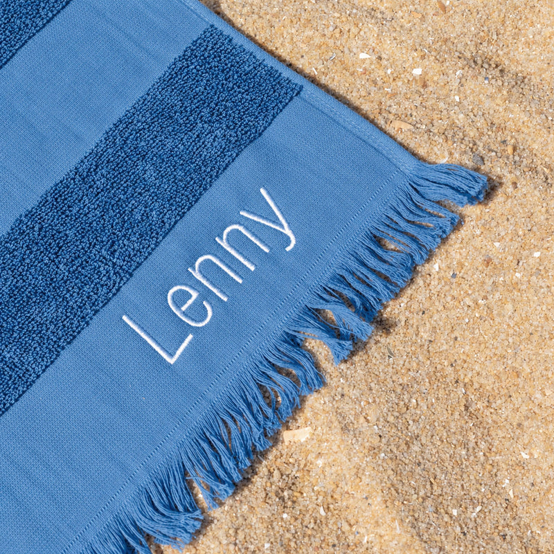 Denim blue cotton hooded beach towel for kids, personalised with their name, perfect for swimming lessons and beach days.