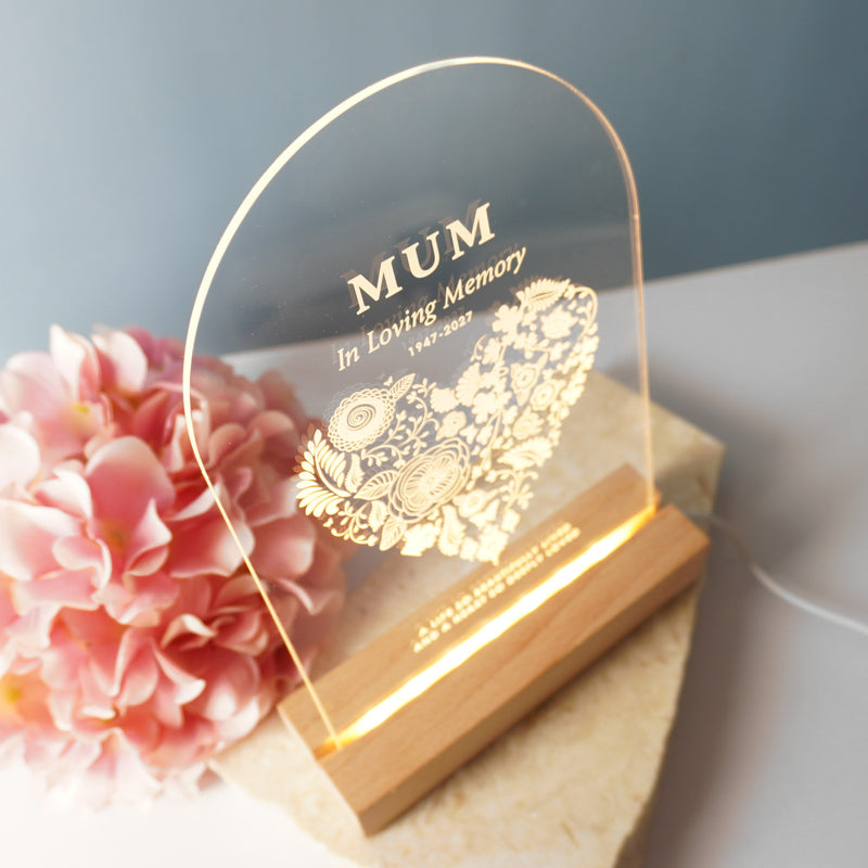 Custom engraved memorial night light, a heartfelt tribute featuring name and date on shatterproof acrylic above a wooden light base.