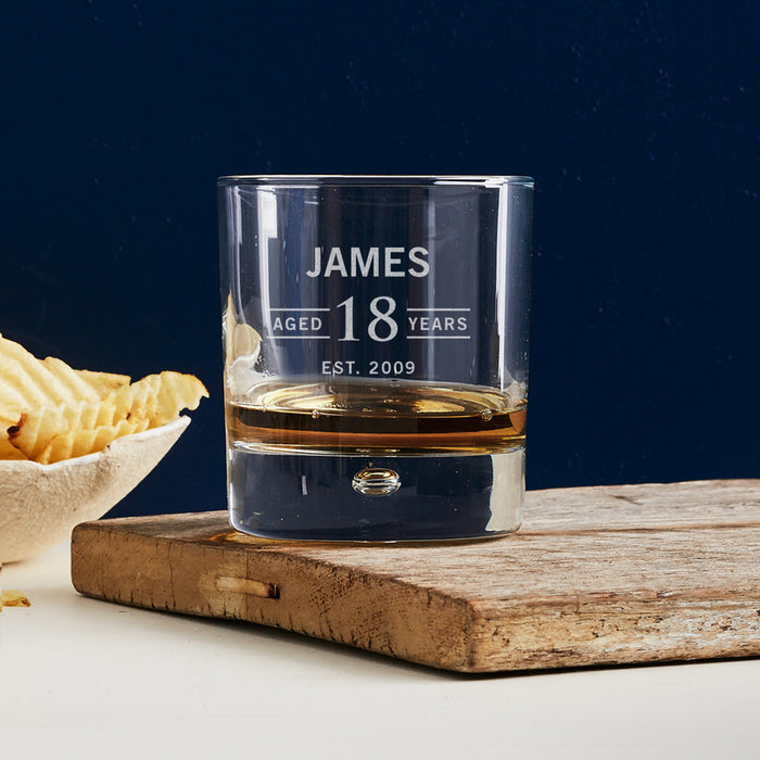 Personalised 305ml round whiskey glass engraved with '18th Birthday' – a unique gift