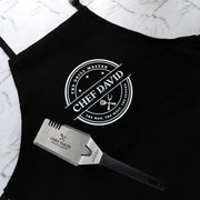Personalised BBQ hamper with a custom printed apron and engraved stainless steel BBQ Mate gift set for Father's Day.