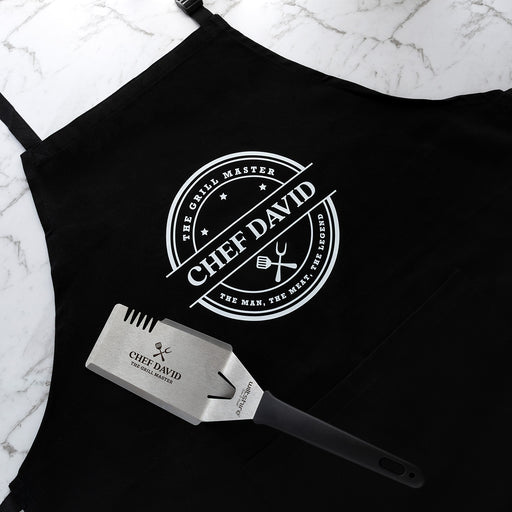 Personalised BBQ hamper with a custom printed apron and engraved stainless steel BBQ Mate gift set for Father's Day.