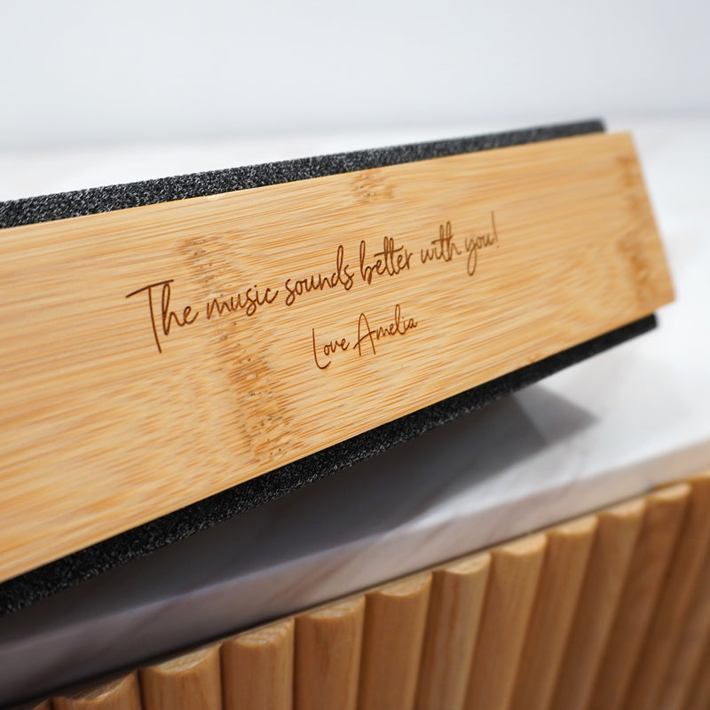 Custom 10W Bluetooth speaker with natural bamboo finish and charcoal fabric speaker grille.