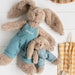 Personalised taupe bunny rabbit set featuring a 40cm bunny with an embroidered name and a 20cm bunny with an initial, dressed in removable blue overalls.