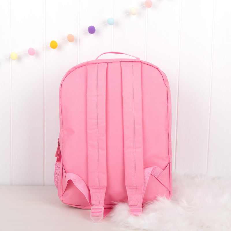 Back view of pink children’s backpack highlighting padded adjustable shoulder straps.