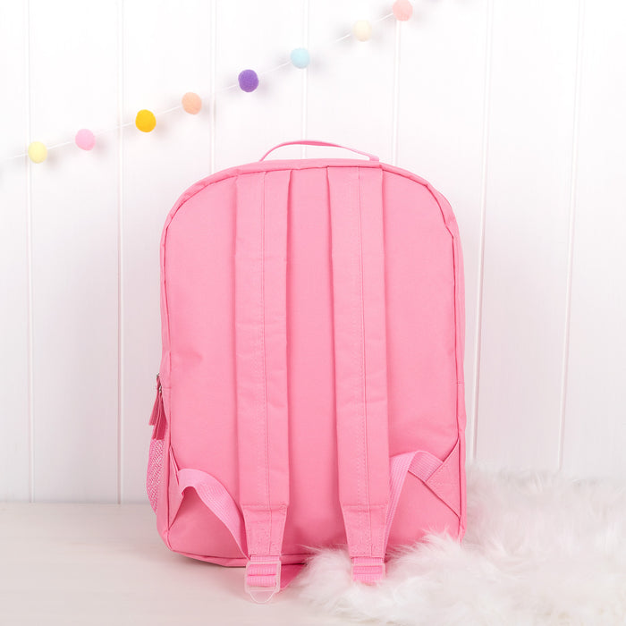 Back view of pink children’s backpack highlighting padded adjustable shoulder straps.