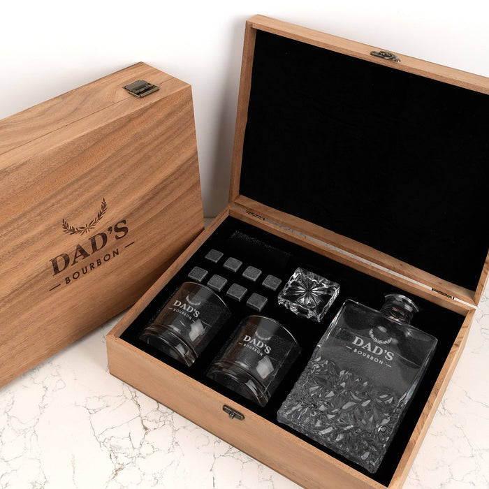 Personalised whiskey decanter set with engraved glasses and stones in walnut gift box.