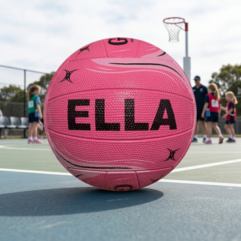 Personalised Gilbert Phoenix pink netball with custom name