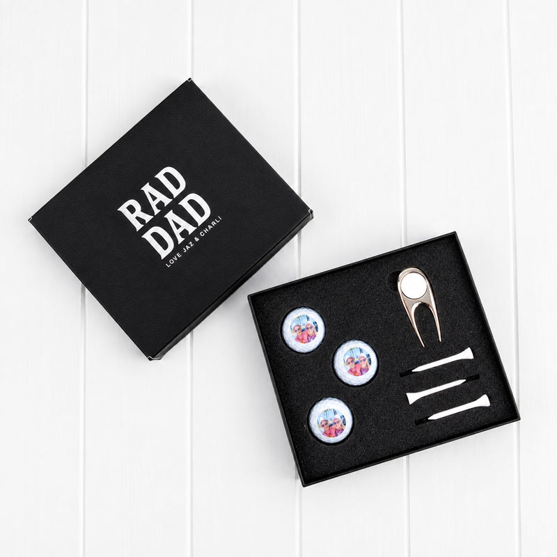 Engraved golf gift set featuring personalised photo golf balls, golf tees and ball marker presented in a black leatherette keepsake box.
