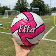 Pink junior soccer ball personalised with name in black print