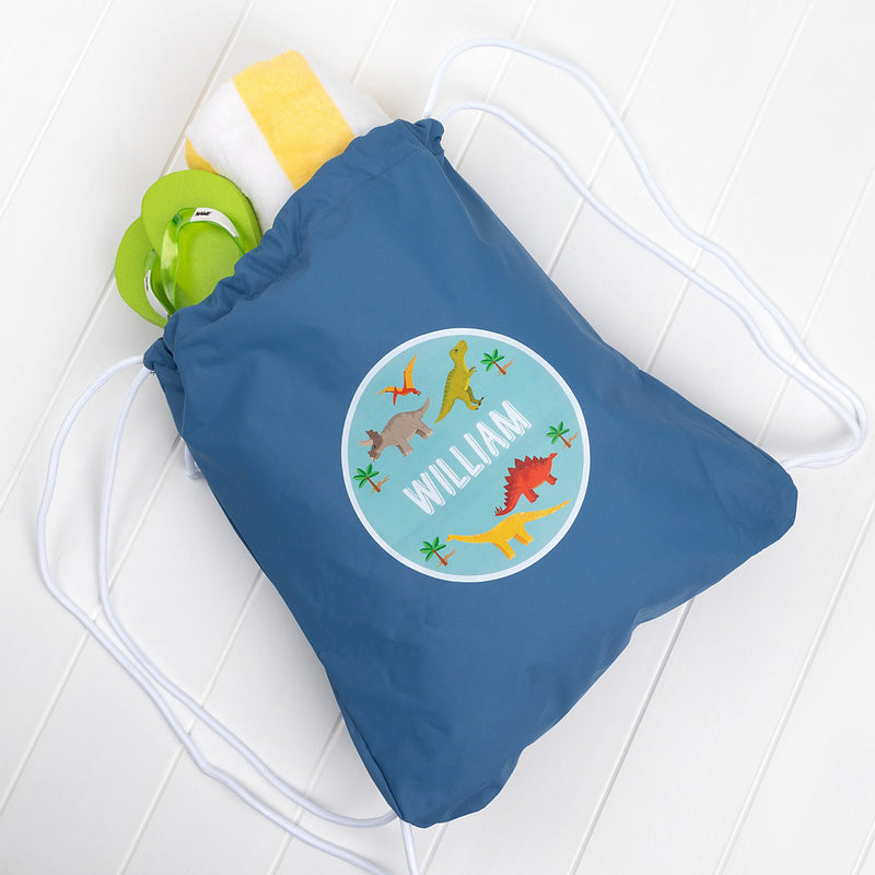 Personalised kids swim bag with dinosaur design and custom name print.