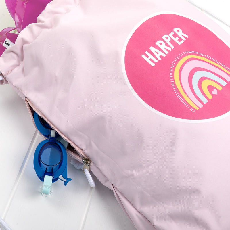 Close-up of custom rainbow swim bag showing side zip pocket and vibrant artwork.