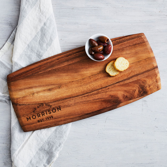 Personalised walnut tapas board with engraved wedding details, perfect for newlyweds
