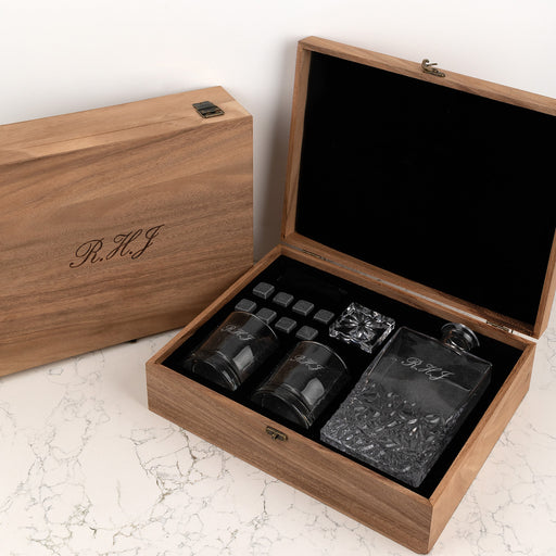 Personalised whiskey decanter gift set with engraved initials in walnut box.