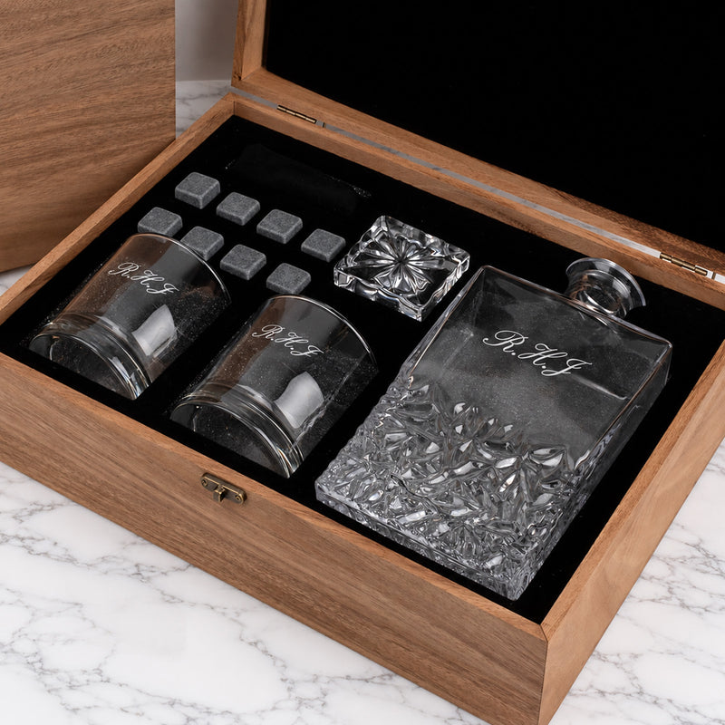 Custom monogram whiskey set with glasses, stones, and decanter in wooden box.