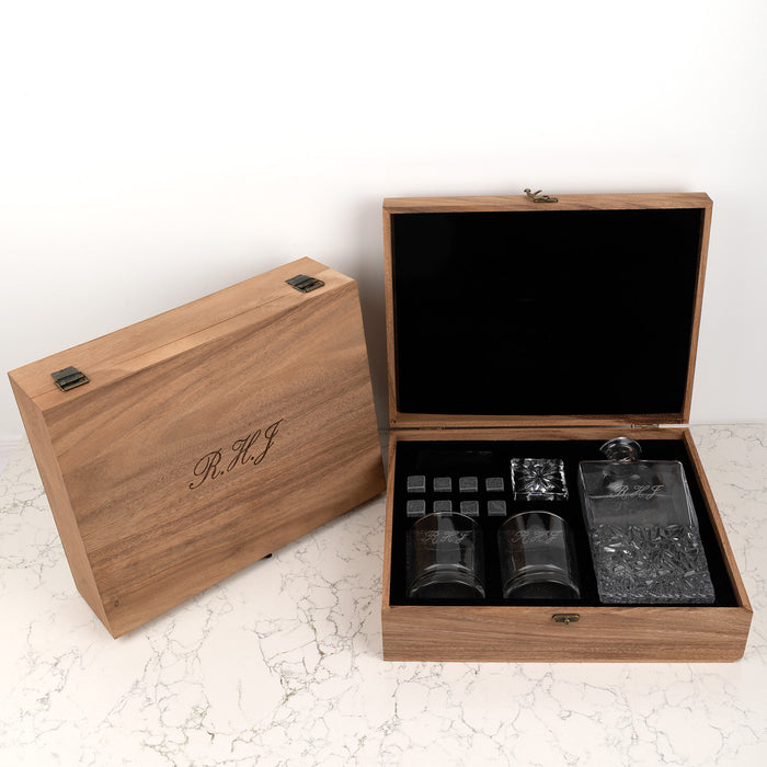 Engraved glass decanter set with whiskey tumblers and gift box for special occasions.