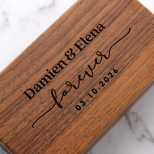 Professionally laser engraved walnut ring box with velvet lining.
