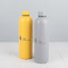 Custom 750ml stainless steel water bottle with engraved branding and leak proof lid