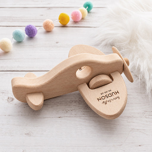 Personalised wooden aeroplane toy engraved with child’s name in premium beech wood