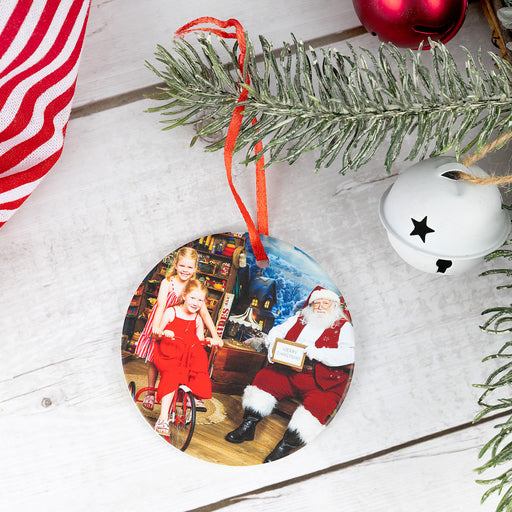 Personalised ceramic Christmas decoration printed with a family photo