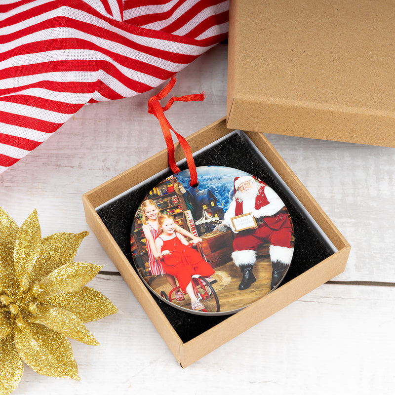 Personalised photo Christmas decoration presented in a kraft gift box