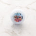 Set of three personalised golf balls with custom photo, presented in a black gift box.