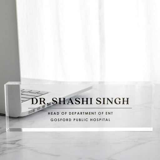 Personalised acrylic office desk sign with name and role printed in black