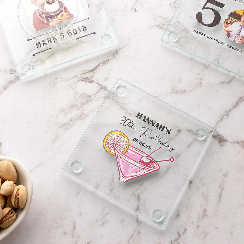 Personalised glass coaster birthday favour with custom artwork, creating a practical keepsake for guests to take home.