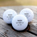 Personalised golf balls in a black gift box, custom printed with initials – perfect birthday gift for a golf lover.