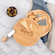 Custom engraved round wooden cheese board with knife set, perfect for corporate gifting