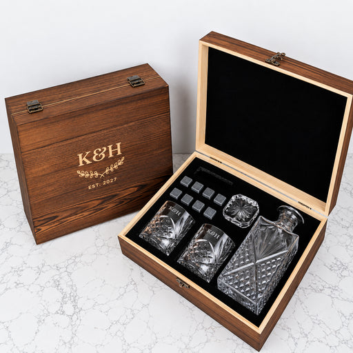 Personalised wedding whiskey gift set with 870ml decanter, two engraved scotch glasses and reusable whiskey stones in a rustic wooden gift box.