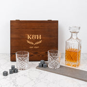 Personalised wooden whiskey gift box with decanter, matching engraved glasses and whiskey stones, a timeless keepsake for newlyweds and couples.
