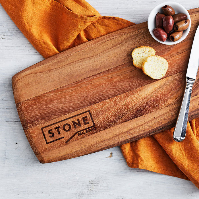 Acacia wood tapas board with custom engraving, perfect for corporate gifting and special occasions.