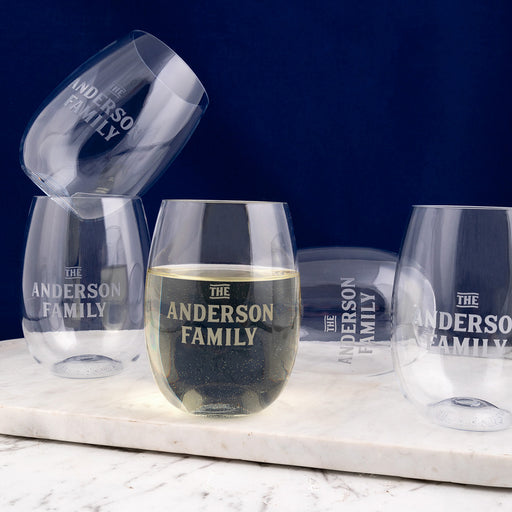 Set of six unbreakable stemless wine glasses personalised with family name