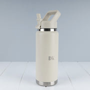 Stone personalised insulated water bottle with custom laser engraving and carry handle.