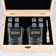 Premium corporate whiskey set with personalised glasses, whiskey stones and company logo engraved on a wooden gift box for clients and executives.
