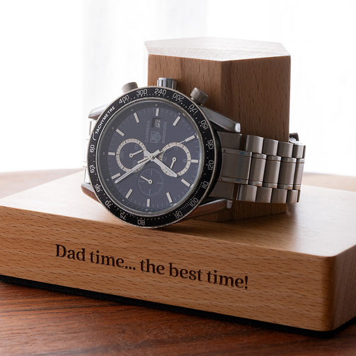 Custom beech wood watch holder with engraved base, designed to keep a favourite watch organised on a bedside table or dresser.