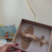 Personalised wooden aeroplane toy engraved with child’s name and birth date, made from natural beech wood