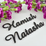 Laser cut acrylic place cards with guest names